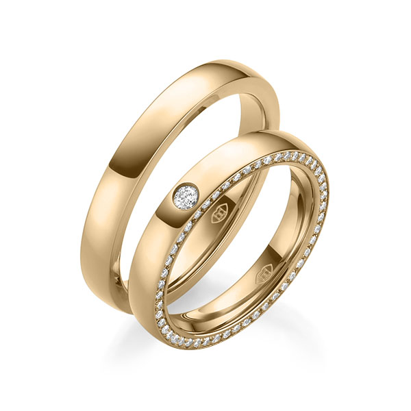 Paar klassische Memoire-Trauringe/Eheringe in aussen Roségold 585 , innen Roségold 585 vollausgefasst mit zus. 0,31 ct. Brillant tw, si 