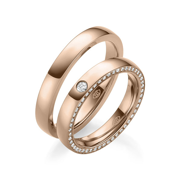 Paar klassische Memoire-Trauringe/Eheringe in außen Rotgold 585 , innen Rotgold 585 vollausgefasst mit zus. 0,31 ct. Brillant tw, si 