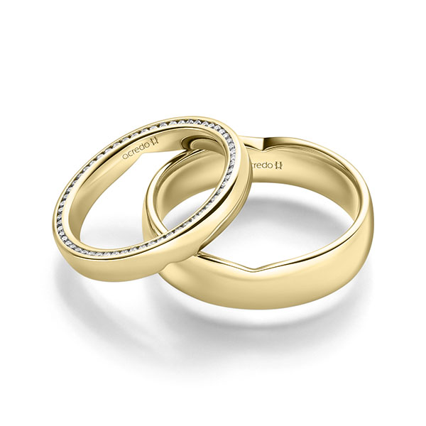 Paar klassische Memoire-Trauringe/Eheringe in Gelbgold 585 vollausgefasst mit zus. 0,27 ct. Brillant tw, si von acredo