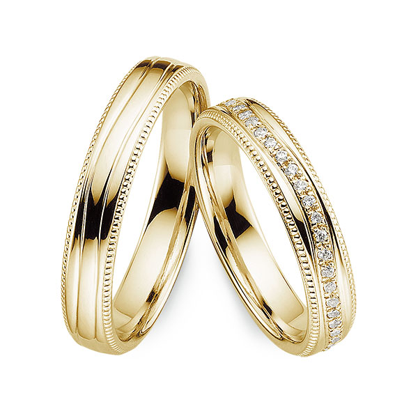 Paar klassische Memoire-Trauringe/Eheringe in Gelbgold 585 vollausgefasst mit zus. 0,27 ct. Brillant tw, si von Merii
