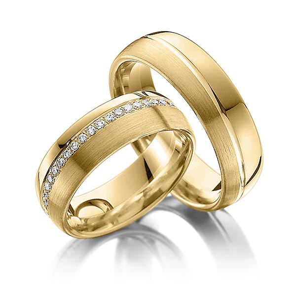 Paar klassische Memoire-Trauringe/Eheringe in Gelbgold 585 vollausgefasst mit zus. 0,43 ct. Brillant tw, si von Steinberg