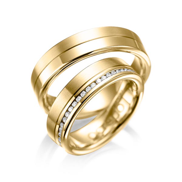 Paar klassische Memoire-Trauringe/Eheringe in Gelbgold 585 vollausgefasst mit zus. 0,46 ct. Brillant tw, si von acredo