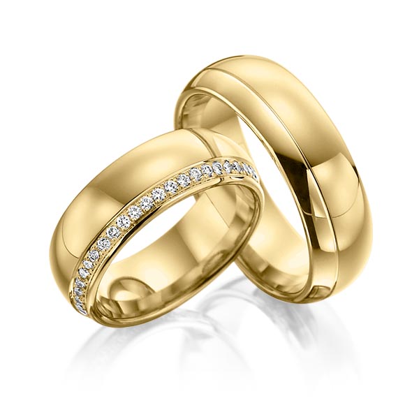 Paar klassische Memoire-Trauringe/Eheringe in Gelbgold 585 vollausgefasst mit zus. 0,48 ct. Brillant tw, si von Steinberg