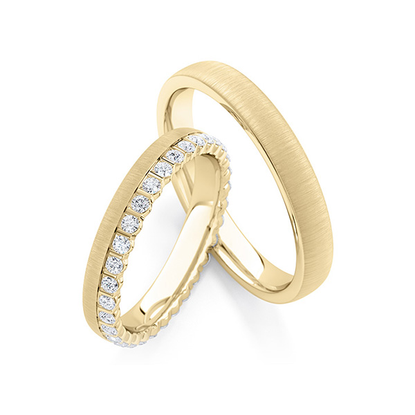 Paar klassische Memoire-Trauringe/Eheringe in Gelbgold 585 vollausgefasst mit zus. 0,66 ct. tw, si von Steinberg