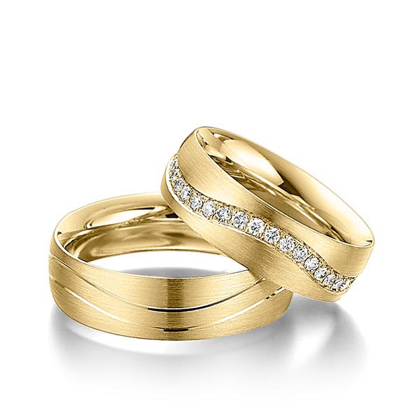 Paar klassische Memoire-Trauringe/Eheringe in Gelbgold 585 vollausgefasst mit zus. 0,68 ct. Brillant tw, si von Steinberg