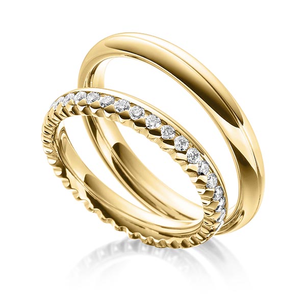 Paar klassische Memoire-Trauringe/Eheringe in Gelbgold 585 vollausgefasst mit zus. 0,72 ct. Brillant tw, si von Steinberg