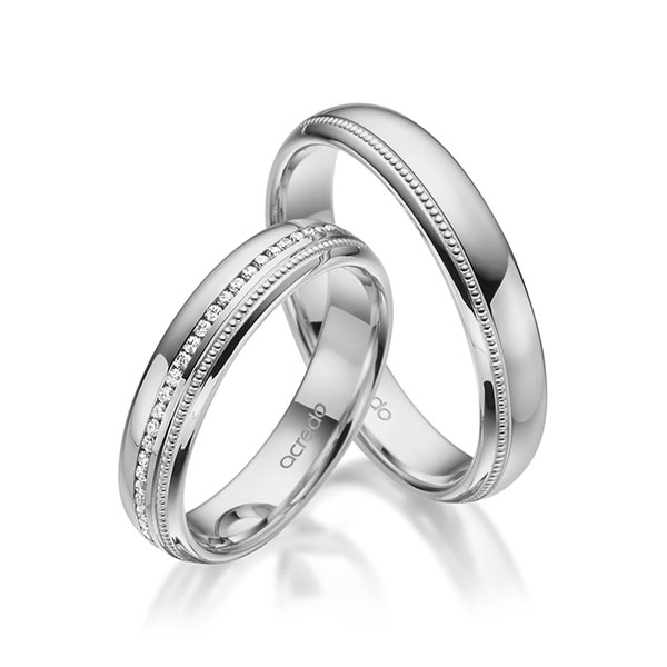 Paar klassische Memoire-Trauringe/Eheringe in Graugold 585 vollausgefasst mit zus. 0,295 ct. Brillant tw, si von acredo