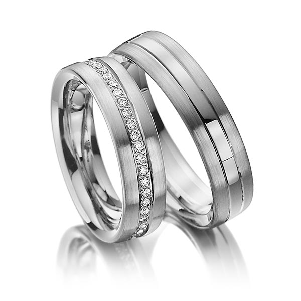 Paar klassische Memoire-Trauringe/Eheringe in Palladium 500 vollausgefasst mit zus. 0,48 ct. Brillant tw, si von Steinberg