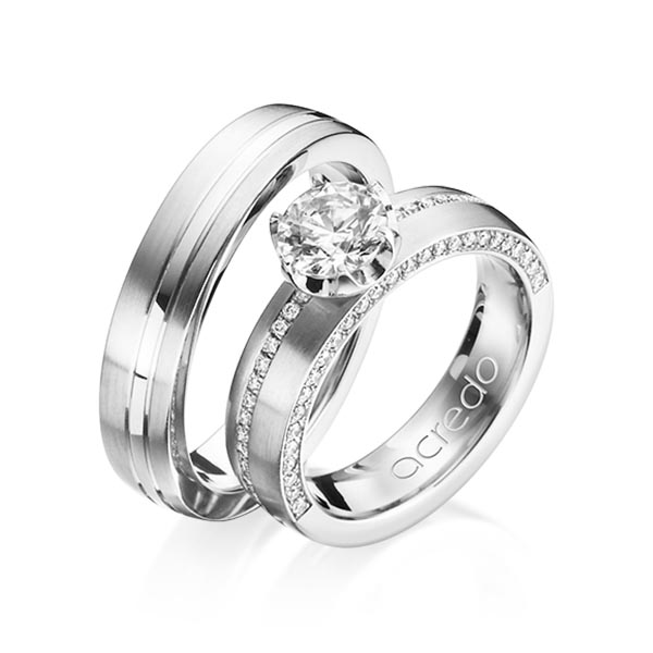 Paar klassische Memoire-Trauringe/Eheringe in Palladium 950 halbausgefasst mit 0,7 ct. + zus. 0,275 ct. Brillant tw, si tw, vs von acredo