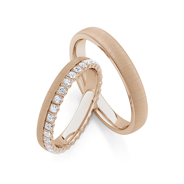 Paar klassische Memoire-Trauringe/Eheringe in Peach-Gold 585 vollausgefasst mit zus. 0,66 ct. tw, si von Steinberg