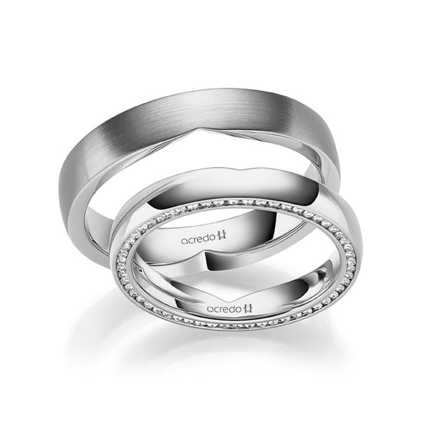 Paar klassische Memoire-Trauringe/Eheringe in Platin 600 vollausgefasst mit zus. 0,27 ct. Brillant tw, si von acredo