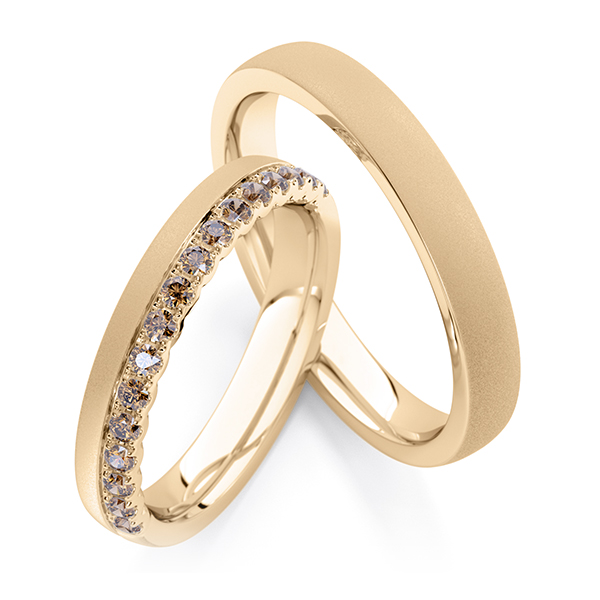 Paar klassische Memoire-Trauringe/Eheringe in Roségold 585 halbausgefasst mit zus. 0,32 ct. cognac von Steinberg
