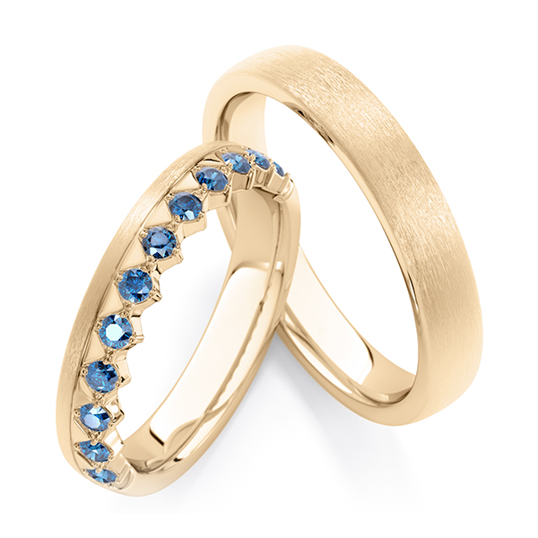 Paar klassische Memoire-Trauringe/Eheringe in Roségold 585 halbausgefasst mit zus. 0,36 ct. oceanblue von Steinberg
