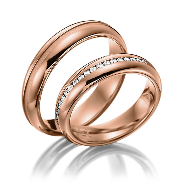 Paar klassische Memoire-Trauringe/Eheringe in Rotgold 585 halbausgefasst mit zus. 0,22 ct. Brillant tw, si von Steinberg