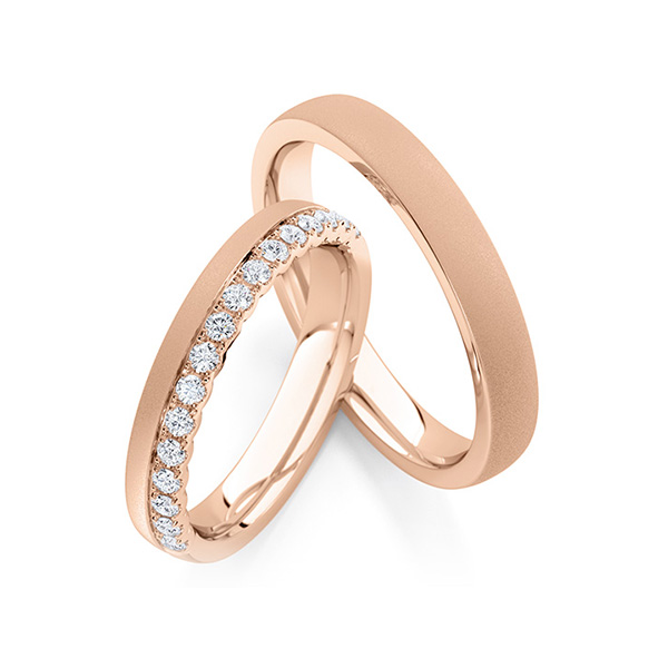 Paar klassische Memoire-Trauringe/Eheringe in Rotgold 585 halbausgefasst mit zus. 0,32 ct. tw, si von Steinberg