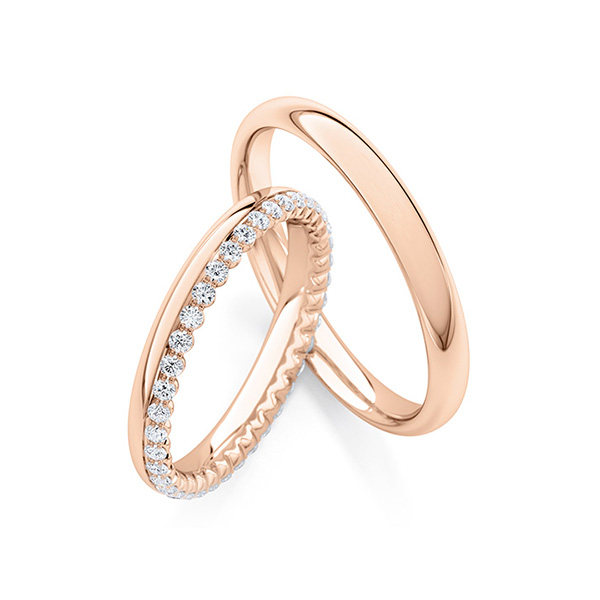 Paar klassische Memoire-Trauringe/Eheringe in Rotgold 585 vollausgefasst mit zus. 0,35 ct. tw, si von Steinberg
