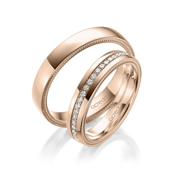 Paar klassische Memoire-Trauringe/Eheringe in Rotgold 585 vollausgefasst mit zus. 0,44 ct. Brillant tw, si von acredo