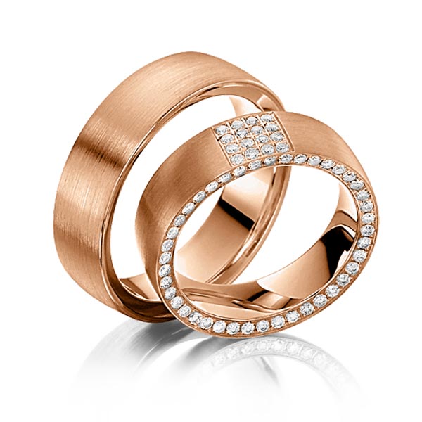 Paar klassische Memoire-Trauringe/Eheringe in Rotgold 585 vollausgefasst mit zus. 0,56 ct. Brillant tw, si von Steinberg