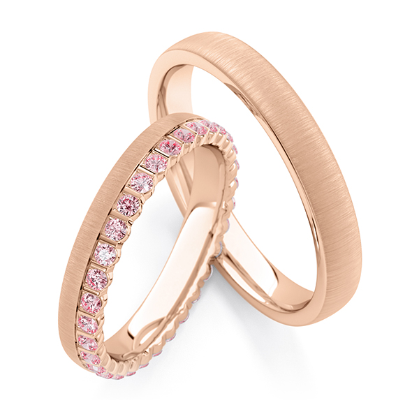 Paar klassische Memoire-Trauringe/Eheringe in Rotgold 585 vollausgefasst mit zus. 0,66 ct. Pink von Steinberg