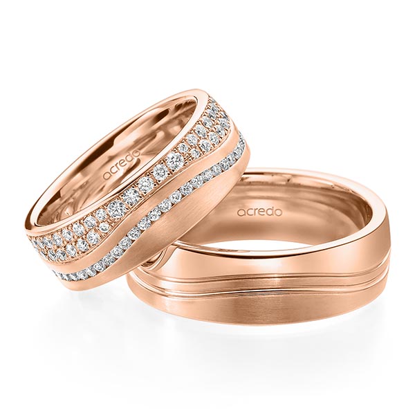 Paar klassische Memoire-Trauringe/Eheringe in Rotgold 585 vollausgefasst mit zus. 1,085 ct. Brillant tw, si von acredo