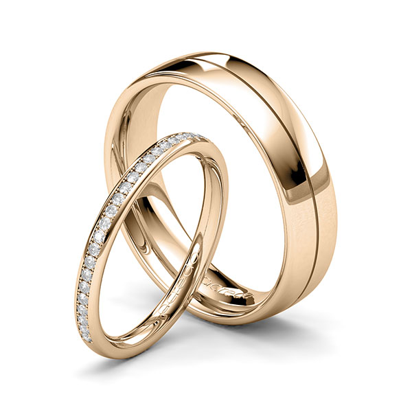 Paar klassische Memoire-Trauringe/Eheringe in Signature Gold 585 halbausgefasst mit zus. 0,184 ct. Brillant tw, si von acredo