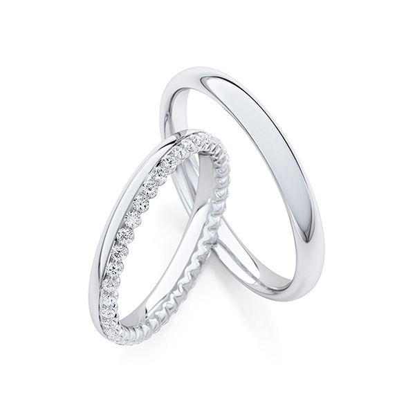 Paar klassische Memoire-Trauringe/Eheringe in Weißgold 585 halbausgefasst mit zus. 0,17 ct. tw, si von Steinberg
