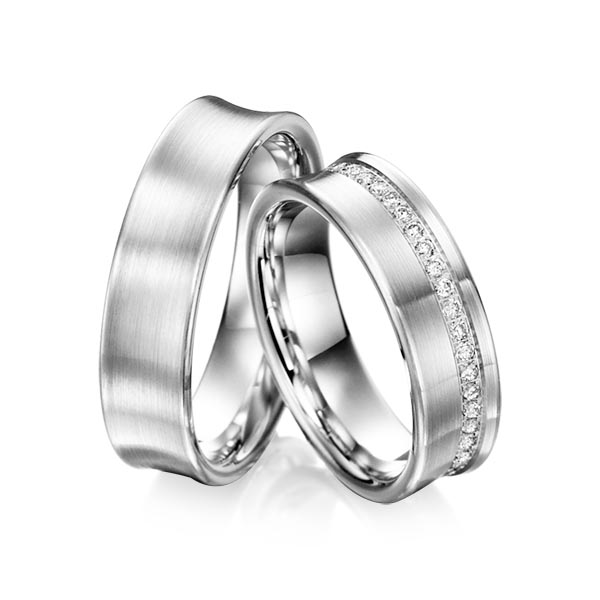 Paar klassische Memoire-Trauringe/Eheringe in Weißgold 585 halbausgefasst mit zus. 0,21 ct. Brillant tw, si von Steinberg