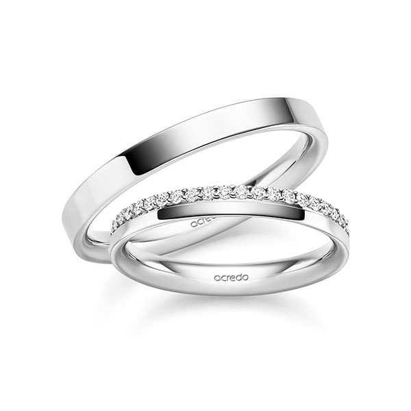 Paar klassische Memoire-Trauringe/Eheringe in Weißgold 585 halbausgefasst mit zus. 0,21 ct. tw, si von acredo