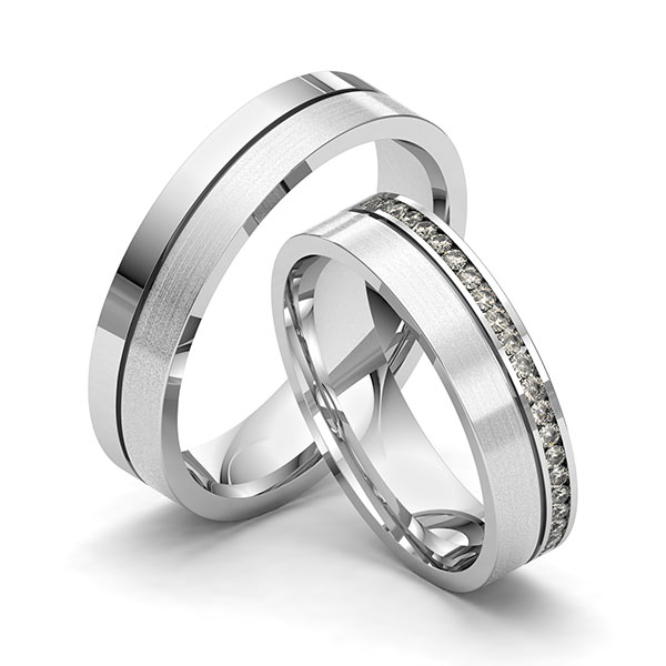 Paar klassische Memoire-Trauringe/Eheringe in Weißgold 585 halbausgefasst mit zus. 0,22 ct. Brillant tw, si von Merii