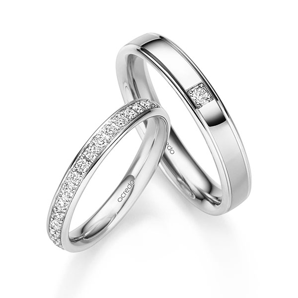 Paar klassische Memoire-Trauringe/Eheringe in Weissgold 585 halbausgefasst mit zus. 0,3 ct. Brillant tw, si von acredo
