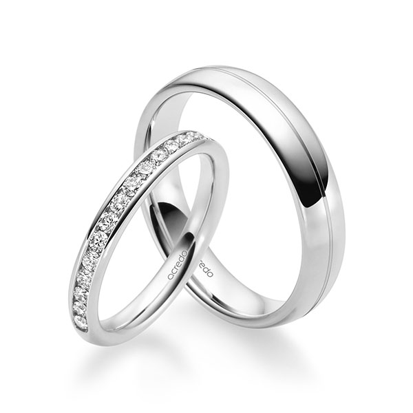 Paar klassische Memoire-Trauringe/Eheringe in Weissgold 585 halbausgefasst mit zus. 0,48 ct. Brillant tw, si von acredo