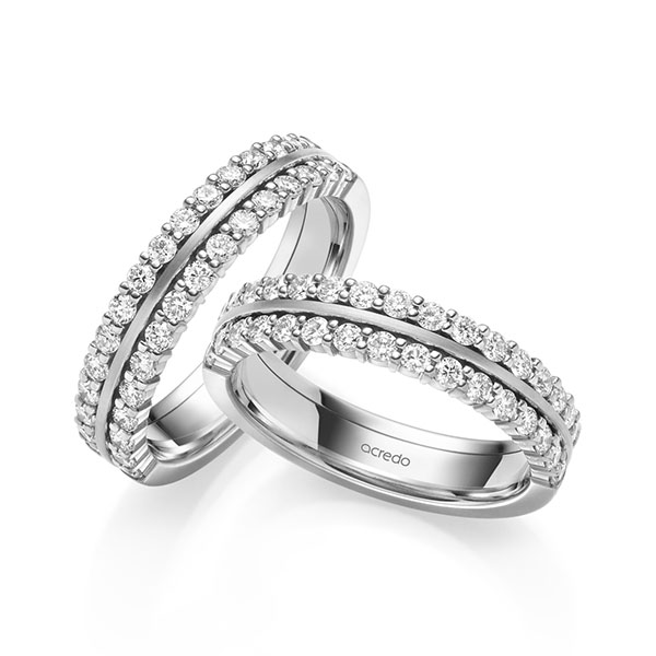 Paar klassische Memoire-Trauringe/Eheringe in Weissgold 585 halbausgefasst mit zus. 1,2 ct. tw, si von acredo