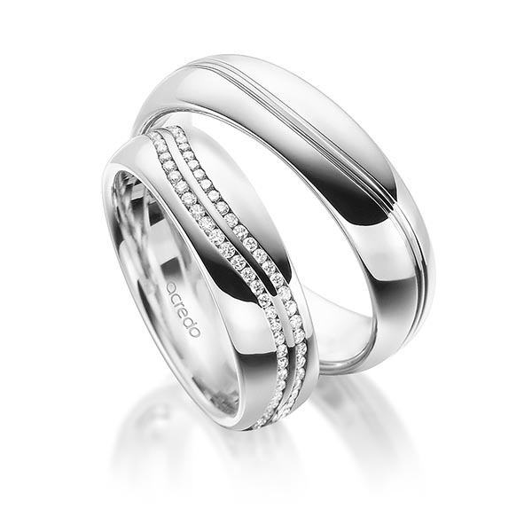 Paar klassische Memoire-Trauringe/Eheringe in Weissgold 585 vollausgefasst mit zus. 0,6 ct. Brillant tw, si von acredo