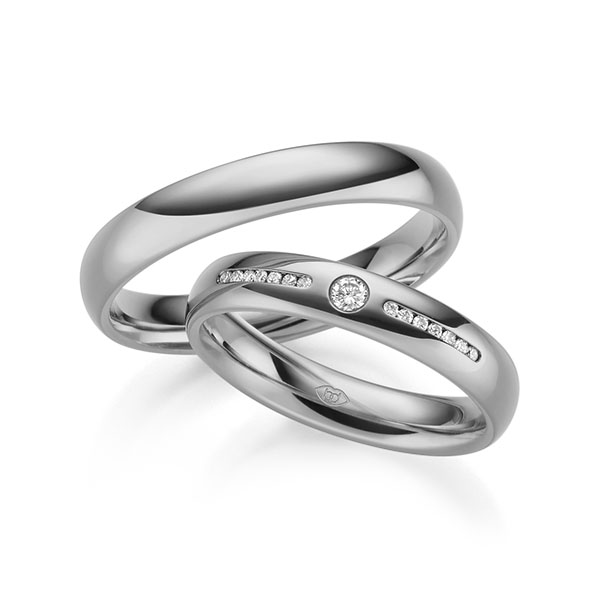 Paar klassische Trauringe/Eheringe in außen Graugold 585 , innen Graugold 585 mit zus. 0,12 ct. Brillant tw, si 