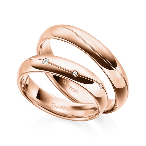 Paar klassische Trauringe/Eheringe in aussen Rotgold 585 , innen Rotgold 585 mit zus. 0,06 ct. Brillant tw, si von acredo - A-1697-7 Paar klassische Trauringe/Eheringe in aussen Rotgold 585 , innen Rotgold 585 mit zus. 0,06 ct. Brillant tw, si von acredo - A-1697-7