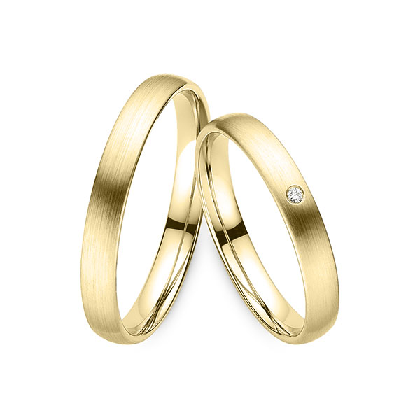 Paar klassische Trauringe/Eheringe in Gelbgold 333 mit zus. 0,01 ct. Brillant w, si von Merii