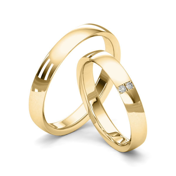 Paar klassische Trauringe/Eheringe in Gelbgold 333 mit zus. 0,03 ct. Brillant tw, si von Merii - M-1216-1