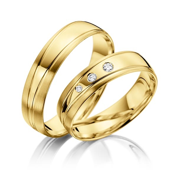 Paar klassische Trauringe/Eheringe in Gelbgold 333 mit zus. 0,06 ct. Brillant tw, si - NP-1180-2 Paar klassische Trauringe/Eheringe in Gelbgold 333 mit zus. 0,06 ct. Brillant tw, si - NP-1180-2