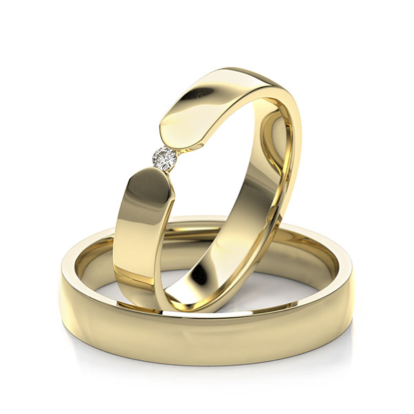 Paar klassische Trauringe/Eheringe in Gelbgold 375 mit zus. 0,03 ct. Brillant tw, si 