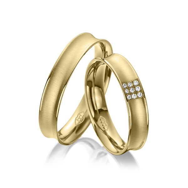 Paar klassische Trauringe/Eheringe in Gelbgold 375 mit zus. 0,045 ct. Brillant tw, vs 