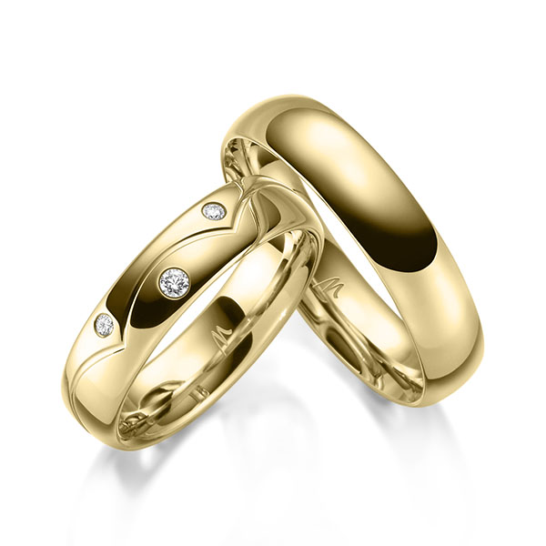 Paar klassische Trauringe/Eheringe in Gelbgold 375 mit zus. 0,06 ct. Brillant tw, si von Merii