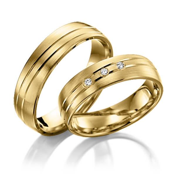 Paar klassische Trauringe/Eheringe in Gelbgold 375 mit zus. 0,06 ct. Brillant tw, si von Steinberg