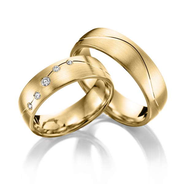 Paar klassische Trauringe/Eheringe in Gelbgold 375 mit zus. 0,1 ct. Brillant tw, si von Steinberg
