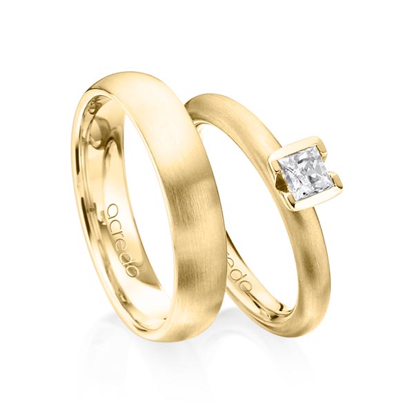 Paar klassische Trauringe/Eheringe in Gelbgold 585 mit 0,4 ct. Prinzess-Diamant tw, vs von acredo