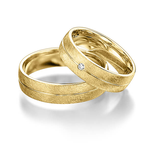 Paar klassische Trauringe/Eheringe in Gelbgold 585 mit zus. 0,015 ct. Brillant tw, si von acredo