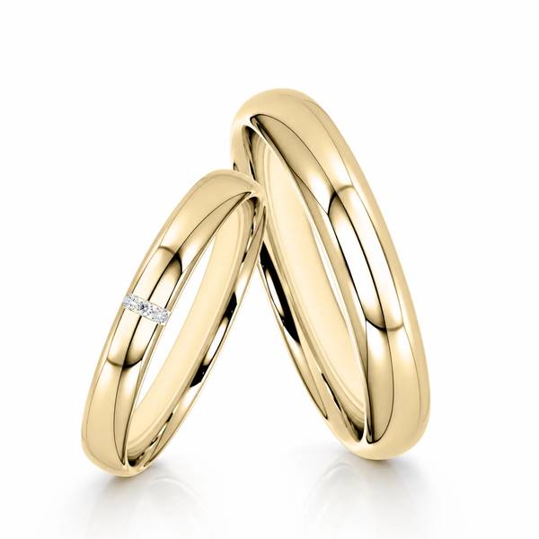 Paar klassische Trauringe/Eheringe in Gelbgold 585 mit zus. 0,015 ct. Brillant von Steinberg