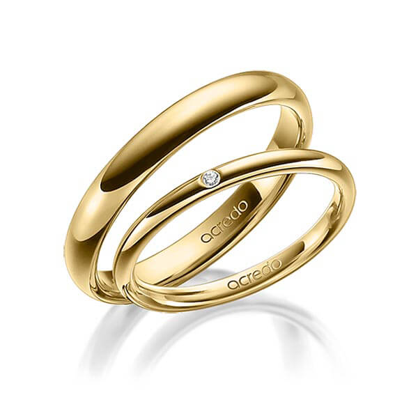 Paar klassische Trauringe/Eheringe in Gelbgold 585 mit zus. 0,01 ct. Brillant tw, si von acredo