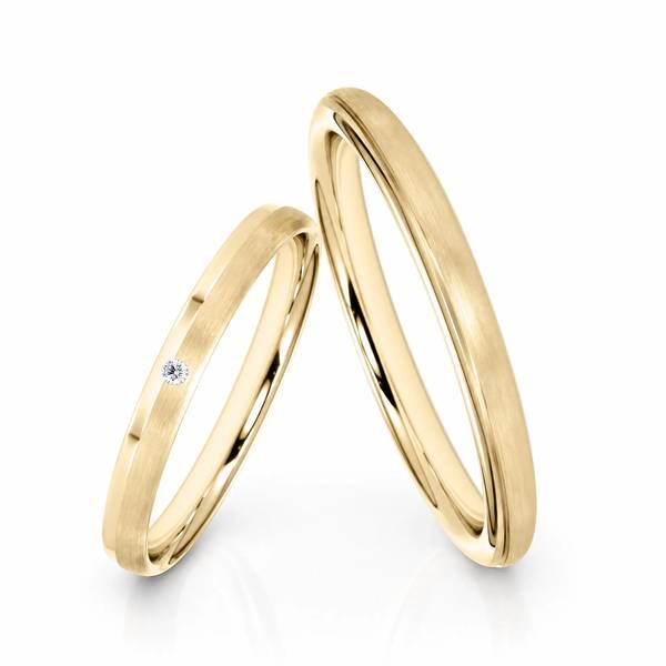 Paar klassische Trauringe/Eheringe in Gelbgold 585 mit zus. 0,01 ct. Brillant von Steinberg