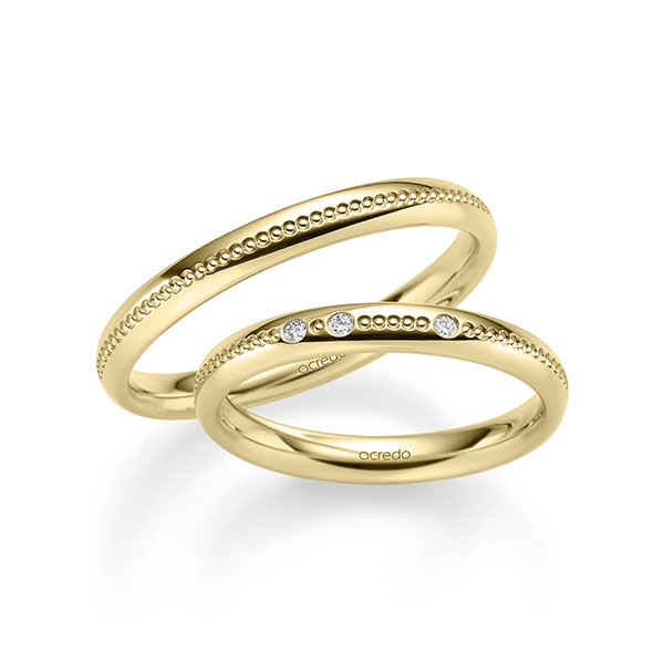 Paar klassische Trauringe/Eheringe in Gelbgold 585 mit zus. 0,03 ct. Brillant tw, si von acredo