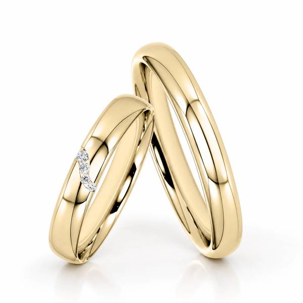 Paar klassische Trauringe/Eheringe in Gelbgold 585 mit zus. 0,03 ct. Brillant von Steinberg